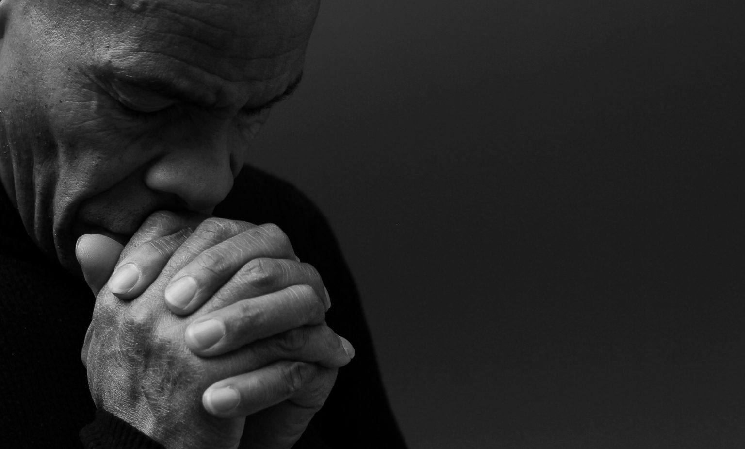 Pastor in prayer